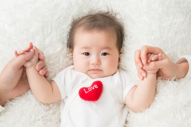 Baby with Red Heart
