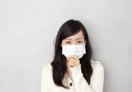 Woman in Flu Mask